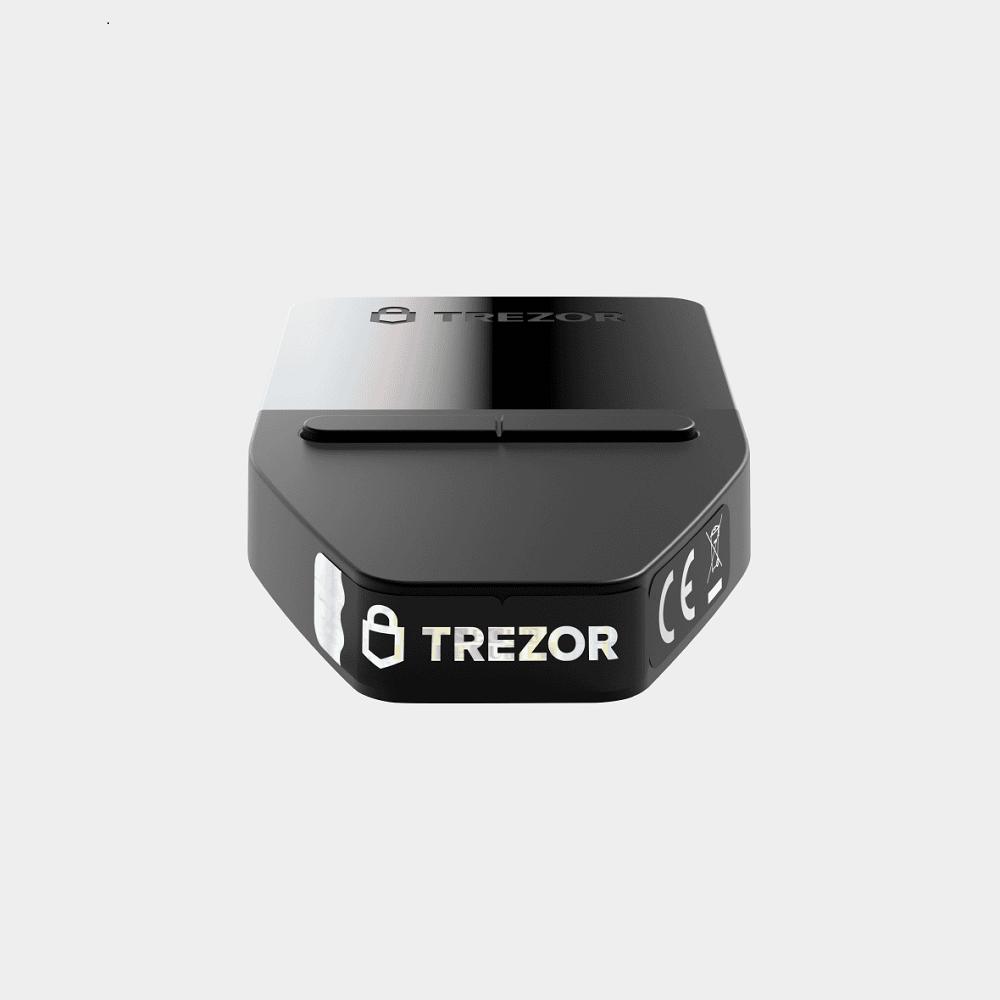 Tem c&oacute; in logo Trezor với hiệu ứng ba chiều đặc trưng, được sử dụng tr&ecirc;n c&aacute;c l&ocirc; sản xuất ban đầu